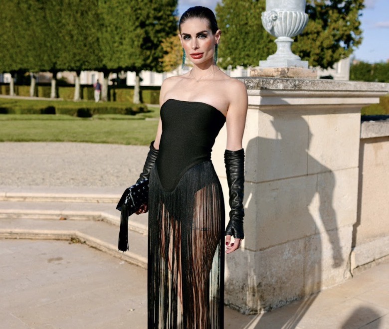 Carina in a black fringe gown in formal chateau gardens